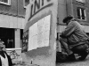 East Berlin residents reading Autonomen anti-government 	propaganda, Mainzerstrasse, Berlin, 1990